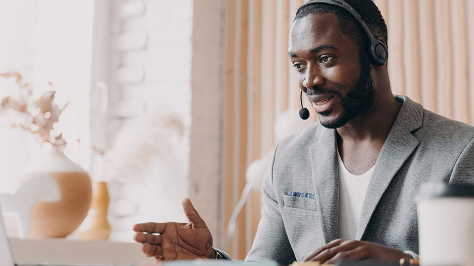 Freight-Broker-On-Headset-Phone