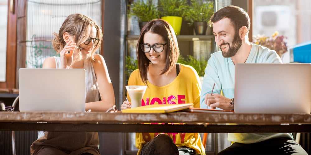 Group collaborating in casual work attire