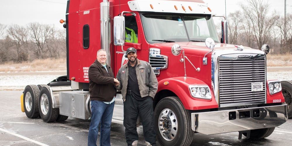 Fleet-manager-shaking-driver-hand