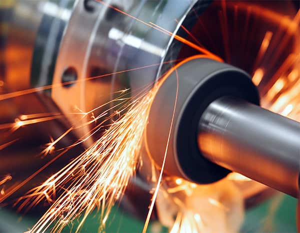 close-up of a tool grinding on a piece of metal