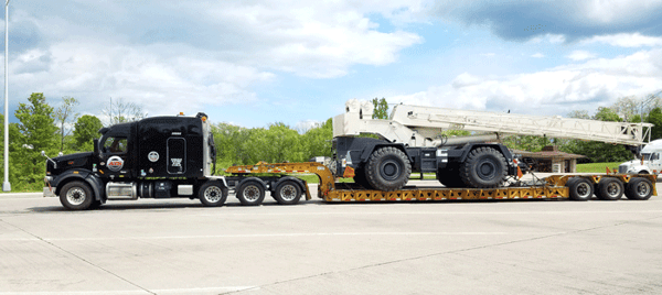 RTC_Rough_Terrain_Crane_on_3-Axle_RGN_Trailer