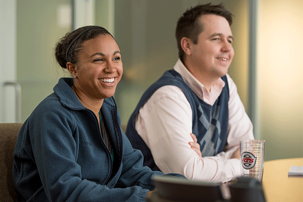 two salespeople interacting