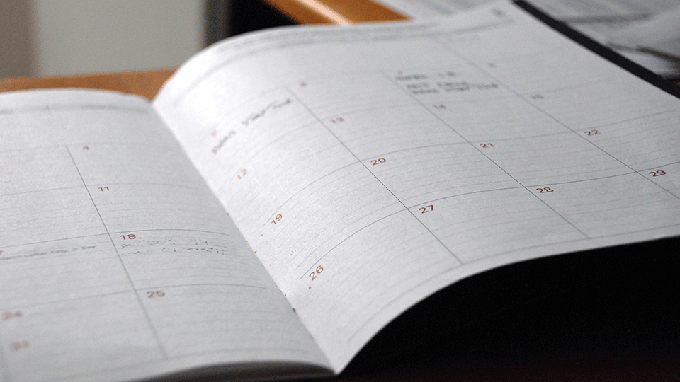 An open calendar-style planner