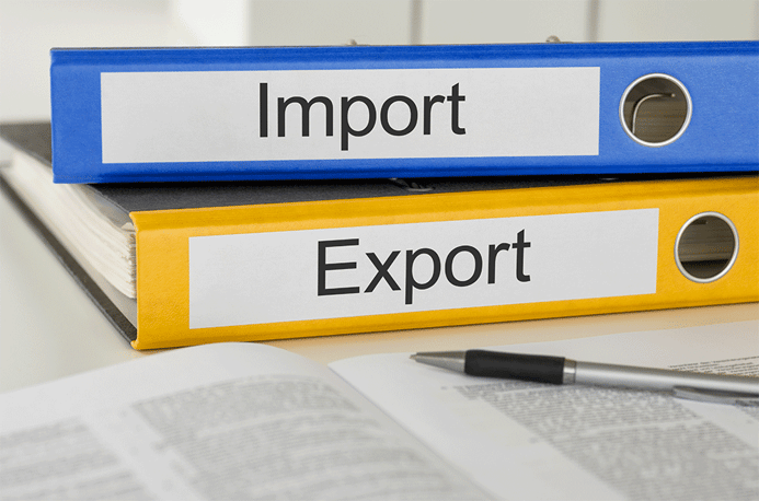 Binders depicting import and export paperwork