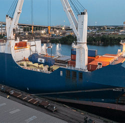 Breakbulk vessel being unloaded onto a rail car