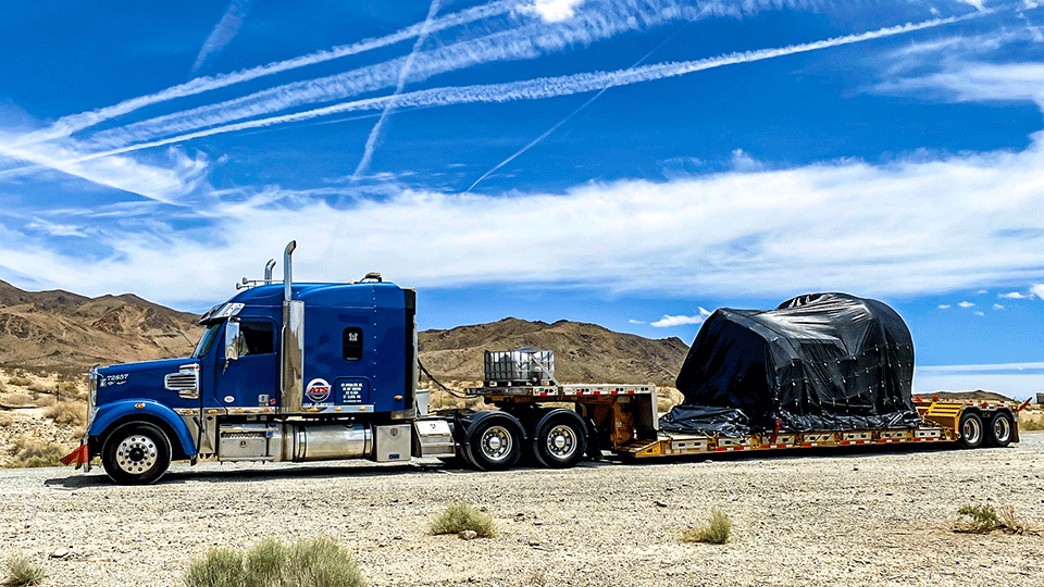 Lowboy-Semi-Trailer-Tarps-On-Shipment