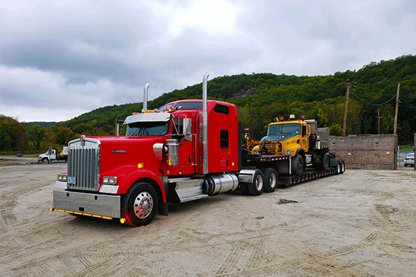 lowboy-trailer-hauling-machinery
