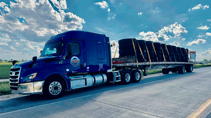 Flatbed-Trailer-Tires-Strapped-Down