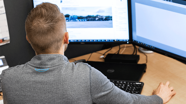 Sales-Representative-at-Desk